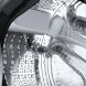 Siemens WG66B2ABNL wasmachine interieur trommel close-up met perforatiepatroon
