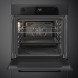 Smeg SF6201TB oven geopende deur, interieur met grill, warmhoudplaat en bakplaat zichtbaar