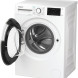 Whirlpool vrijstaande wasmachine met geopende deur en trommel met wasgoed