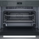 Whirlpool WCT7A9PHTSSG combi-stoomoven met magnetron, geopende deur met zichtbaar interieur en rooster