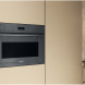 Whirlpool WCT7A9PHTSSG combi-stoomoven met magnetron close-up vooraanzicht in keukensetting