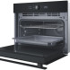 Whirlpool WCW46HMB compact oven zijkant met geopende deur en uitschuifbare bakplaat