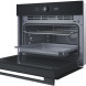 Whirlpool WCW56HMB oven met magnetron, schuiflade uitgetrokken met bakplaat en oven in inbouwsituatie