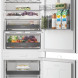 Whirlpool WHK2 5294 B6E koelkast geopend met voedsel in laden en vakken
