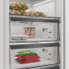 Whirlpool WHMFF 6312 W5E vriezer onderste lade met boter en voedselcontainers