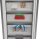 Whirlpool WHMFF 6312 W5E vriezer onderste vakken met bevroren producten en voedselboxen