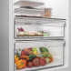 Whirlpool WHMLS 2411 W4E koelkast geopende deur middengedeelte kaaslade en groentela detailed