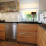Een Smeg inbouw vaatwasser met rvs voorzetdeur. Geeft de keuken een strak design