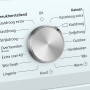 De draaiknop van de Siemens WT48RT70NL warmtepomp droger om het gewenste programma te selecteren