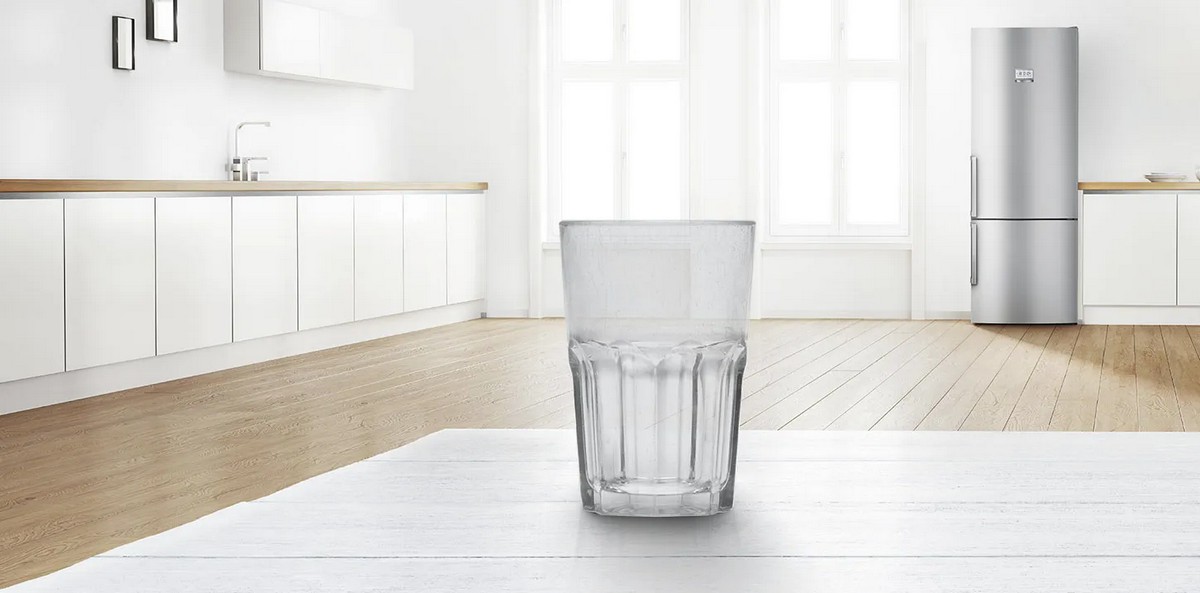 Witte waas op wijnglazen uit de vaatwasser